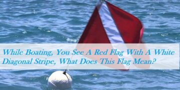 While Boating, You See A Red Flag With A White Diagonal Stripe, What Does This Flag Mean?